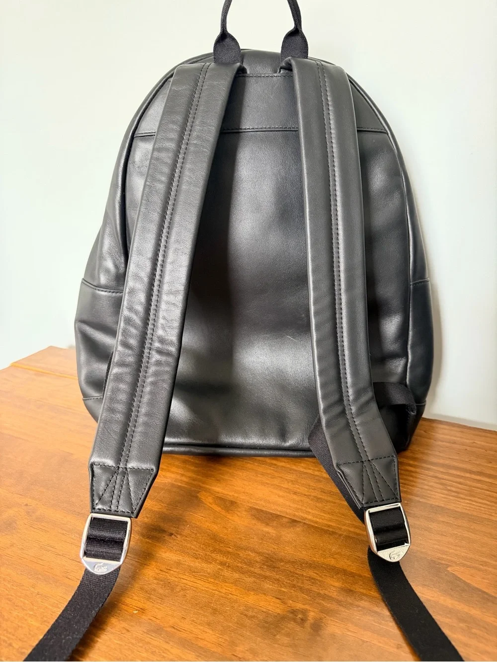Lacoste Black Smooth Leather Backpack with Embossed Logo